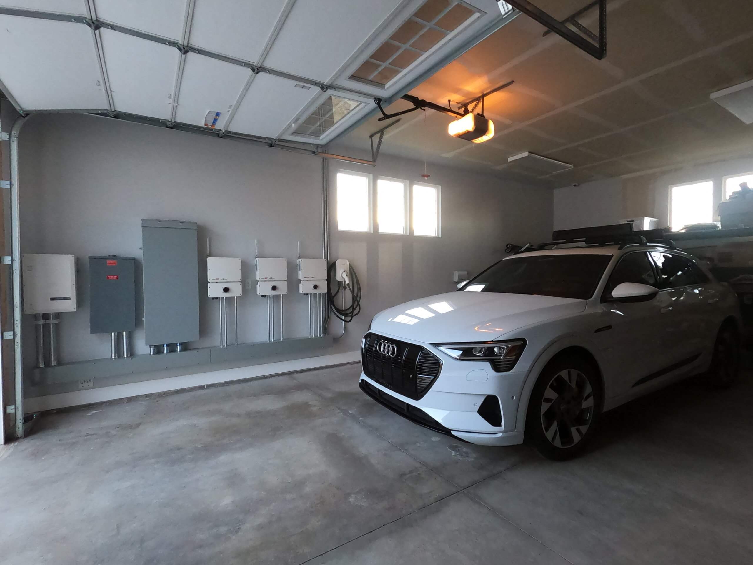 Audi Etron being Charged with SolarEdge Energy Hub Inverters and Electric Car Charger